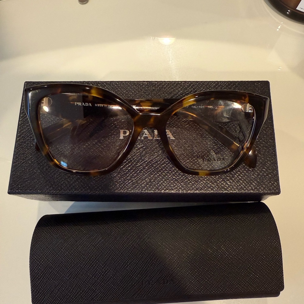 Brand new never used Prada eyeglasses tortoise color